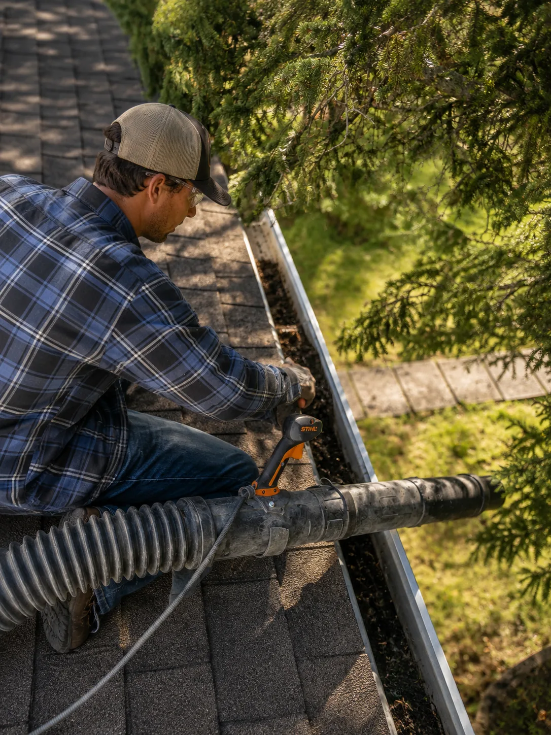 Eavestrough cleaning by Somerset Lawn and Snow in Calgary